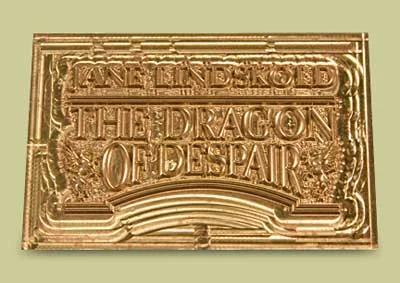 Copper multi-level die with ornate lettering and border